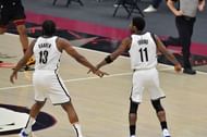 James Harden #13 and Kyrie Irving #11 of the Brooklyn Nets
